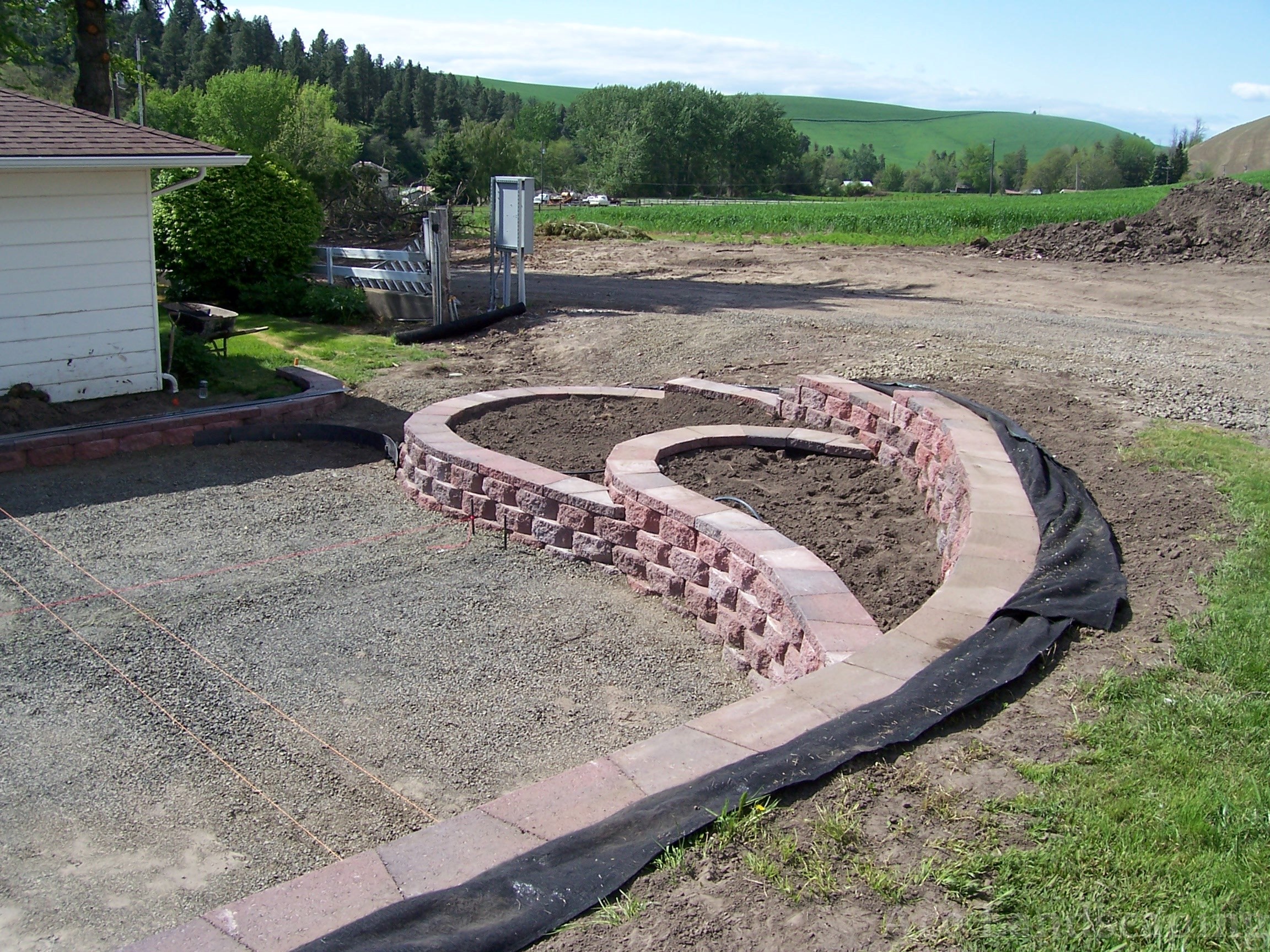 RETAINING WALL CONTRACTOR Brick, Rock, and Concrete Retainer Walls